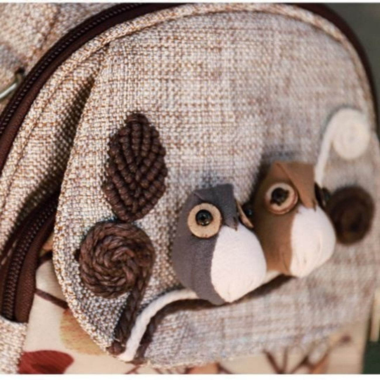 The Happy Bird canvas backpack can be carried by hand, crossbody, and fashionable for commuting on both shoulders